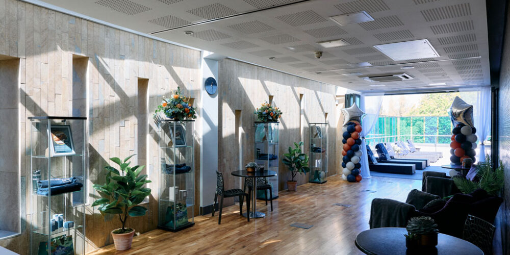 Relaxation area with comfy chairs leading out to the outdoor sun terrace.