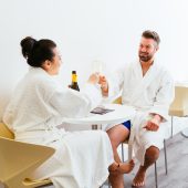 Couple in spa robes relaxing