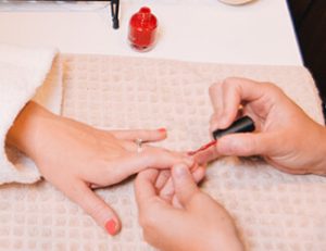Hand manicure - nails being painted