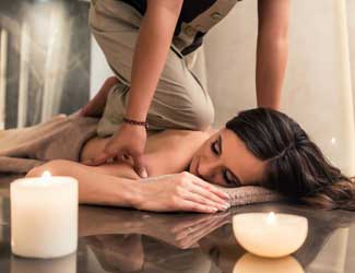 Thai massage being performed in treatment room