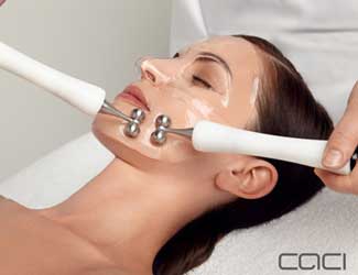 Lady receiving CACI hydrotone facial treatment.