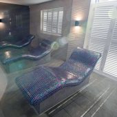 Moulton Spa's blue mosaic heated benches.