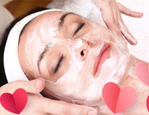 Valentines facial - lady receiving relaxing facial treatment